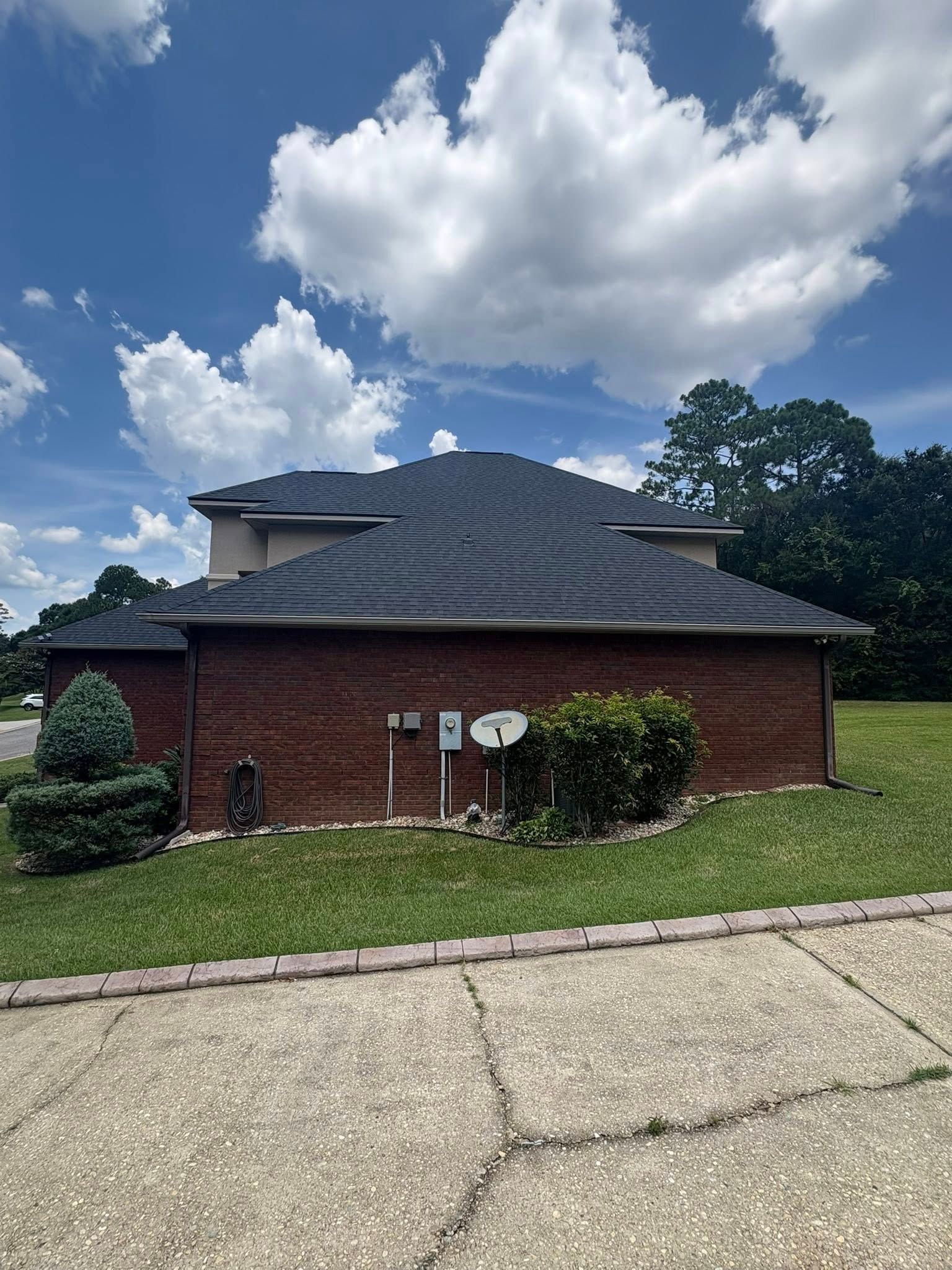 Defender Roofing crew performing roof repair in Fort Walton Beach, FL
