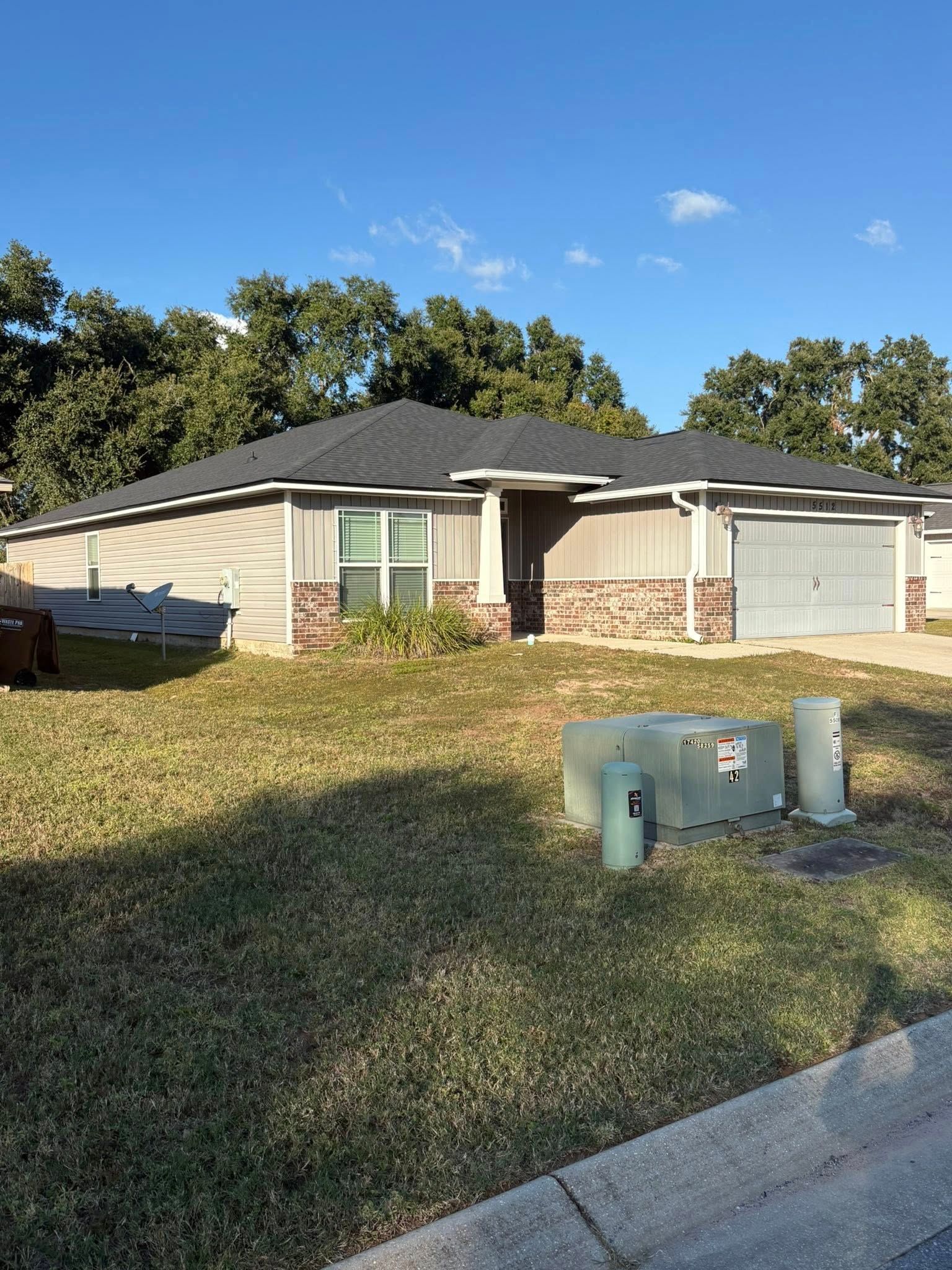 Shingle roof installed by Defender Roofing in Northwest Florida